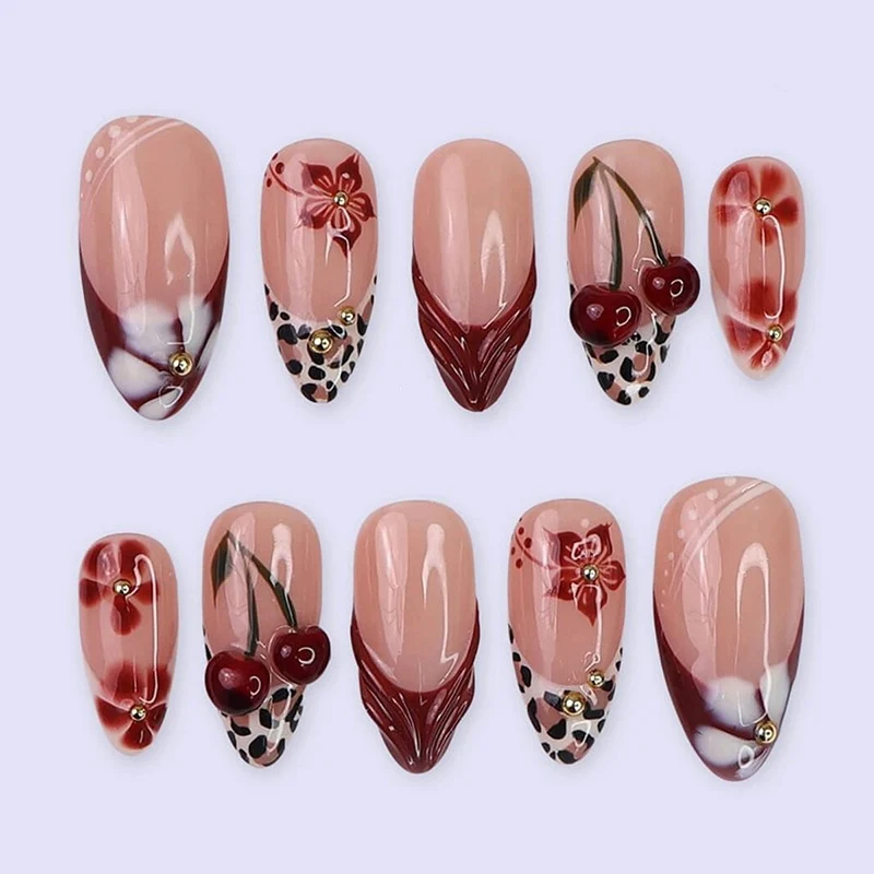 Kunstnagelset mit floralen 3D-Designs und eleganten Akzenten Karnz
