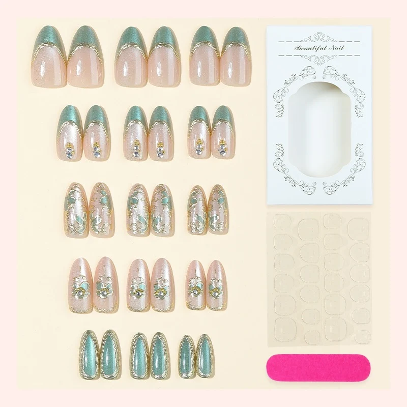 Kunstnagelset mit eleganten Schmucksteinen Karnz