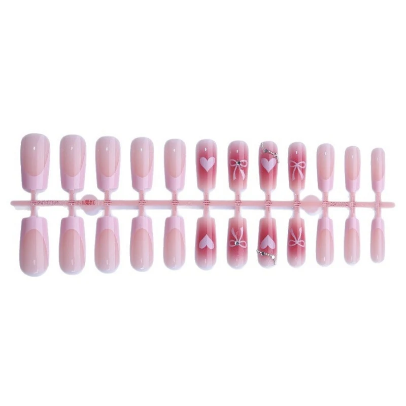 Kunstnagelset mit eleganten Schleifen- und Glitzermotiven Karnz