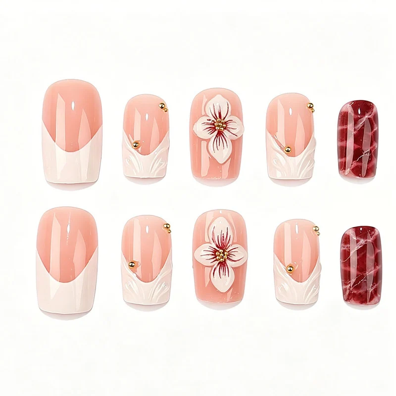 Kunstnagelset mit luxuriösen 3D-Blütenakzenten und Glitzer-Details Karnz