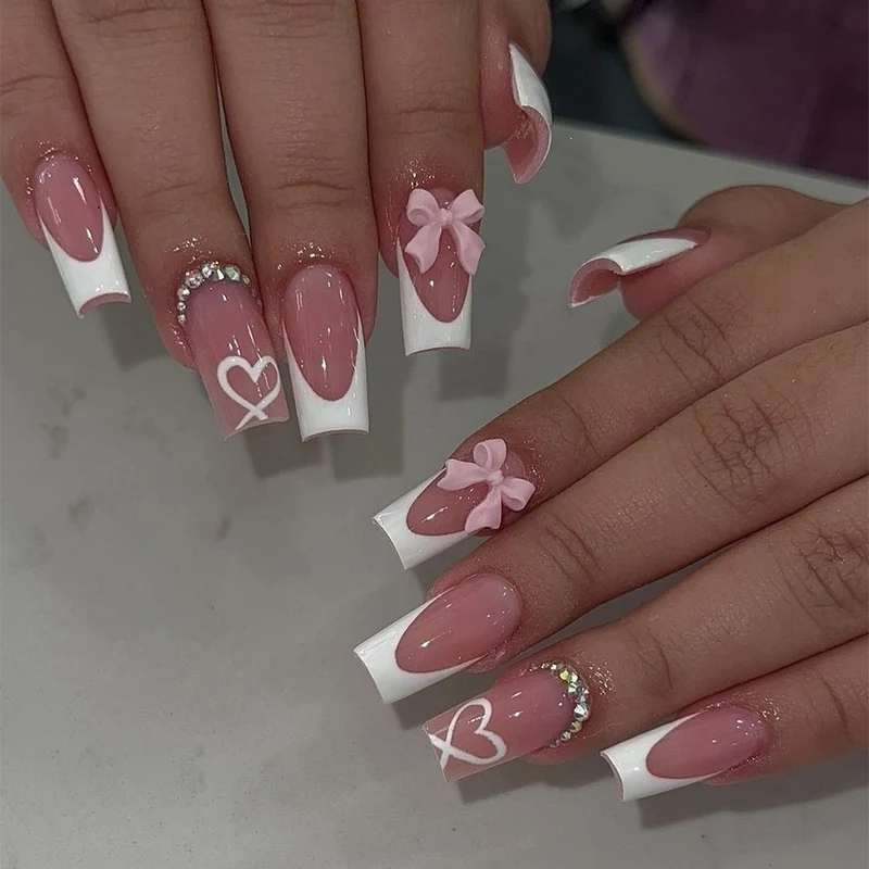 Kunstnagelset mit glamourösem Leopardenmuster und eleganten Schleifen Karnz