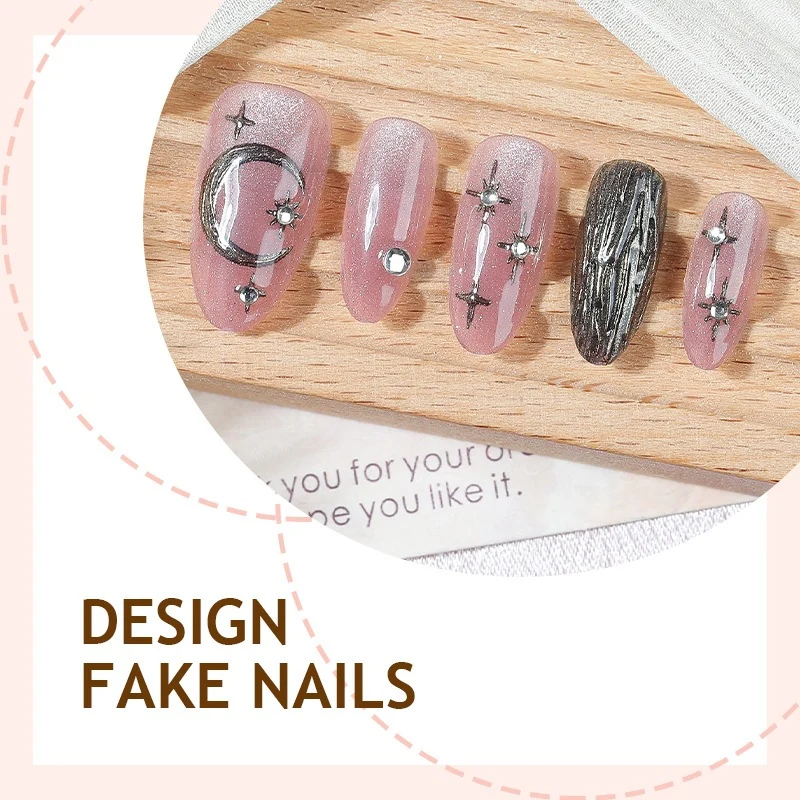 Kunstnagelset mit funkelnden Sternen- und Mondmotiven Karnz