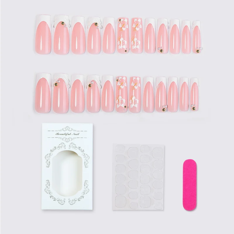 Kunstnagelset mit kunstvollen Blütenmotiven Karnz