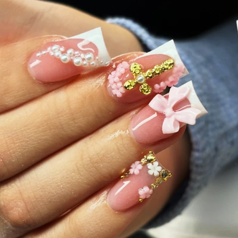 Kunstnagelset mit eleganten Schleifen- und Glitzerelementen Karnz