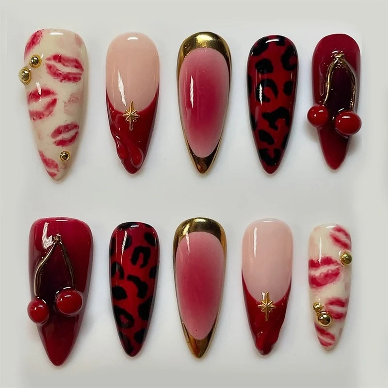 Kunstnagelset mit kreativen fröhlichen Designs und Glitzerdetails Karnz