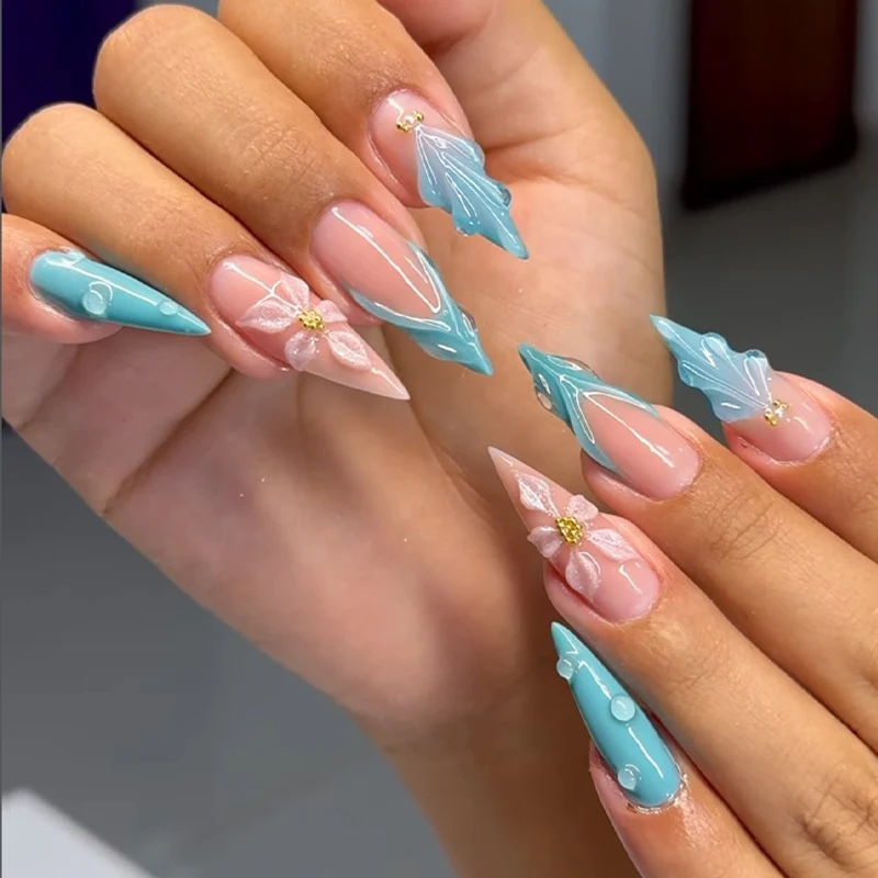 Kunstnagelset mit filigranen Designs Karnz