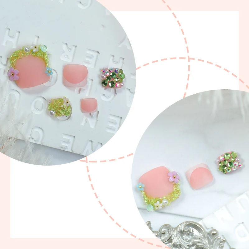 Kunstnagelset mit kreativen Blüten- und Kristallmotiven Karnz