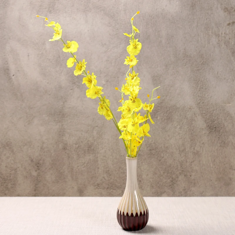 Elegante Blumenarrangement Vase Karnz