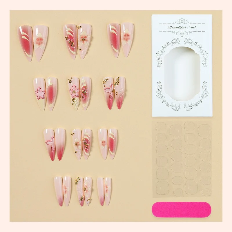 Kunstnagelset mit floralen und glamourösen Designs Karnz