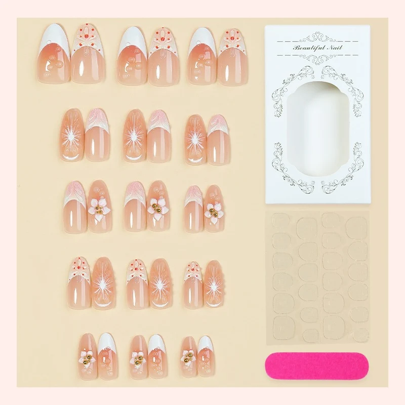 Kunstnagelset mit floralen und eleganten Designs Karnz