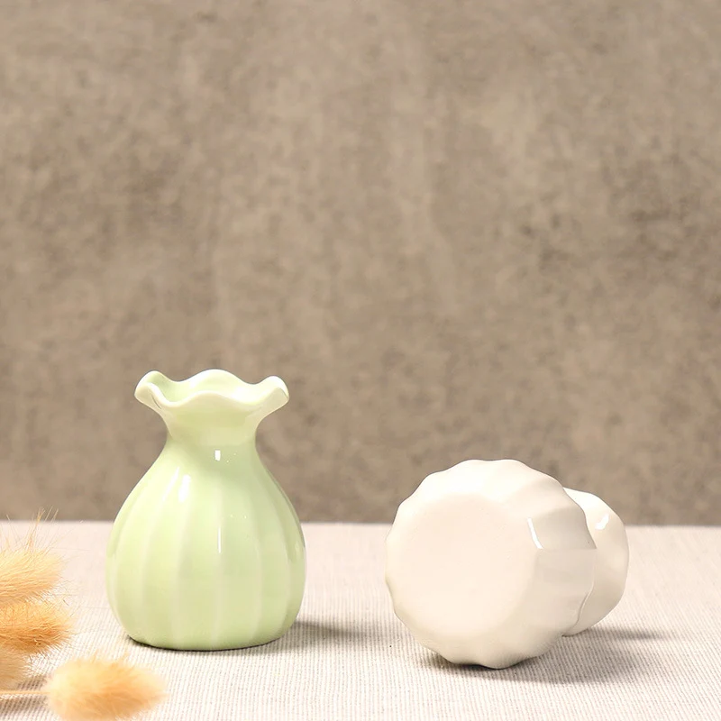 Elegante geschwungene keramische Blumenvase Karnz