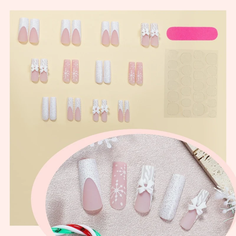 Kunstnagelset mit eleganten Blüten- und Glitzerverzierungen Karnz