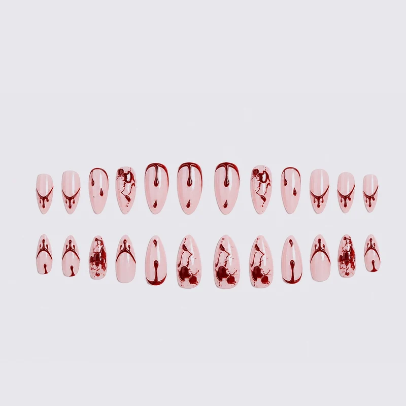 Künstliches Nagelset mit Blutakzenten und kreativen Designs Karnz