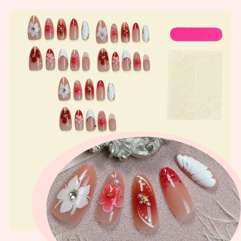 Künstliches Kunstnagelset mit floralem Design und glamourösen Akzenten Karnz