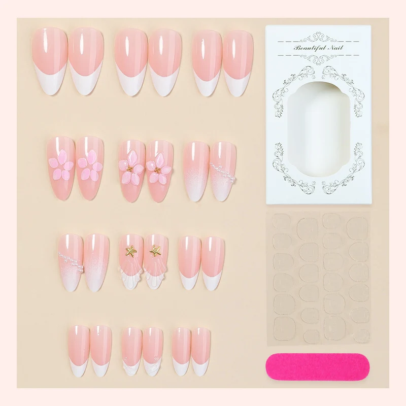 Kunstnagelset mit eleganten Blüten- und Glitzerakzenten Karnz