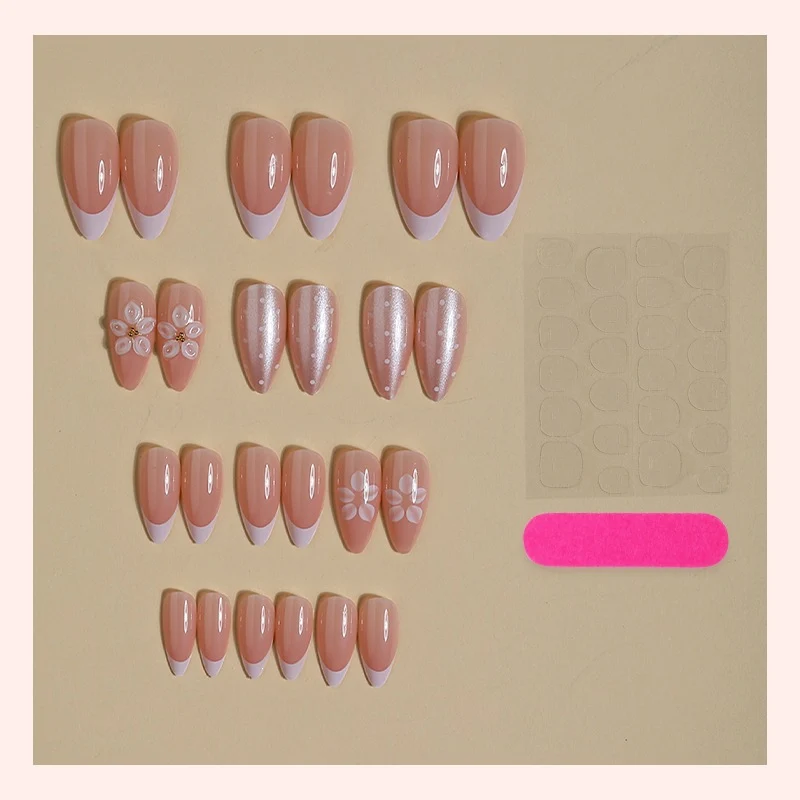 Kunstnagelset mit eleganten Blumen- und Glitzerdesigns Karnz