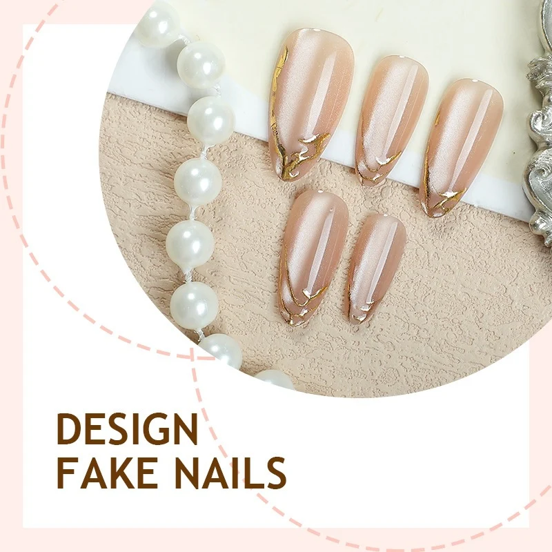 Künstliche Nagelspitzen mit elegantem Goldakzent Karnz