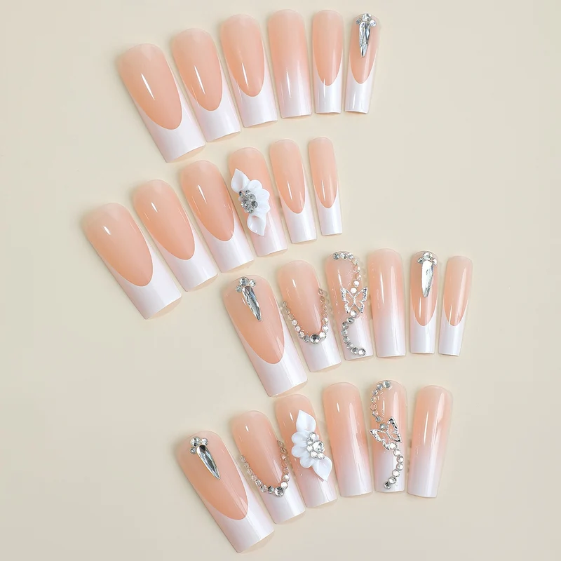 Kunstnagelset mit eleganten 3D-Akzenten und Glitzerverzierungen Karnz