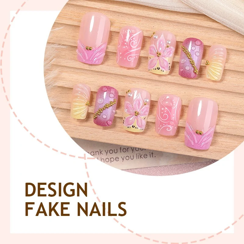Künstliche Nagelkollektion mit floralem Design und Glitzerakzenten Karnz