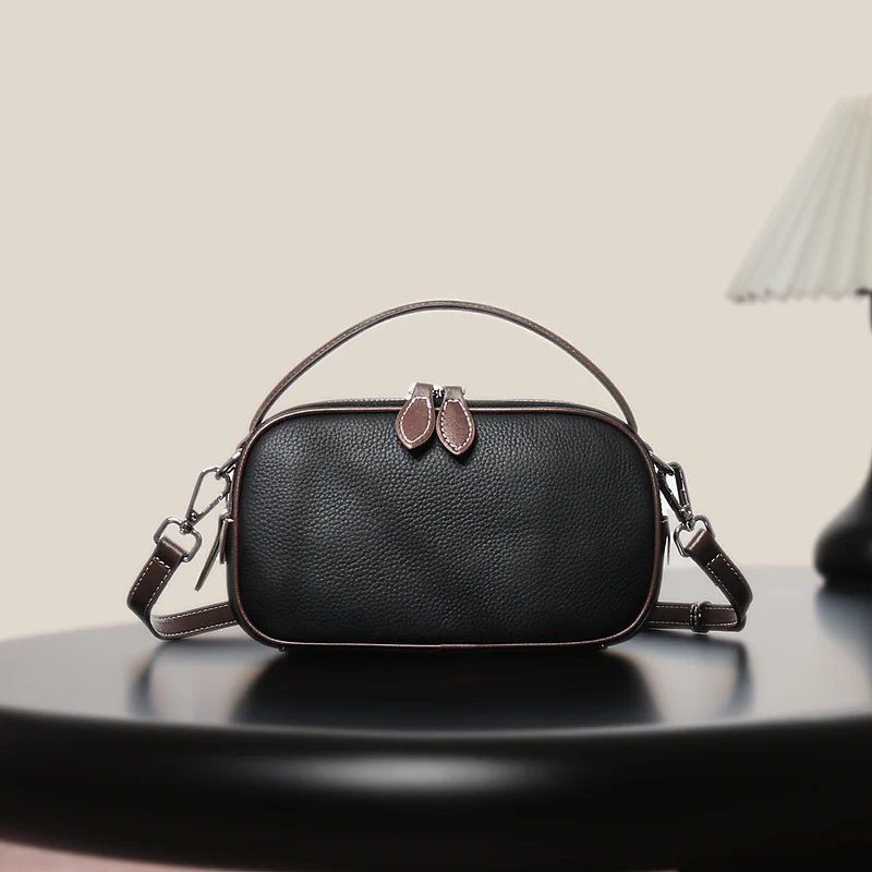 Strukturierte genarbte Leder-Top-Handle-Crossbody-Tasche mit abnehmbarem Riemen