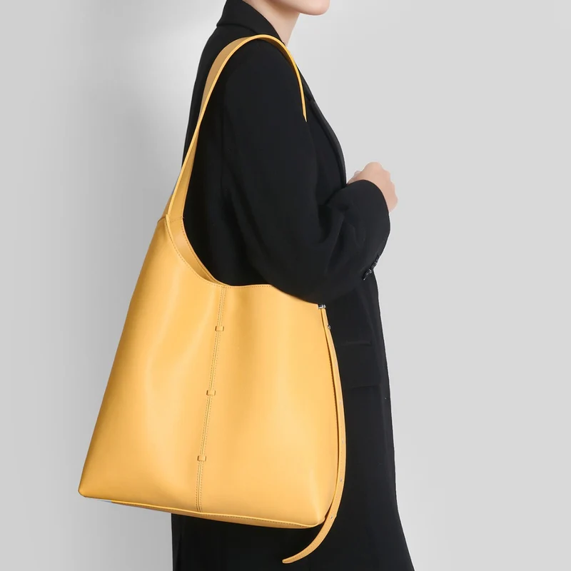 Elegante gebogene Bucket-Hobo-Tasche mit verstellbarem Seitengurt